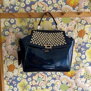 NWT Orli patent leather or patent vinyl, unsure bag with fab rhinestones